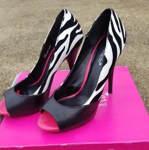 Fun Zebra print hot pink heels.